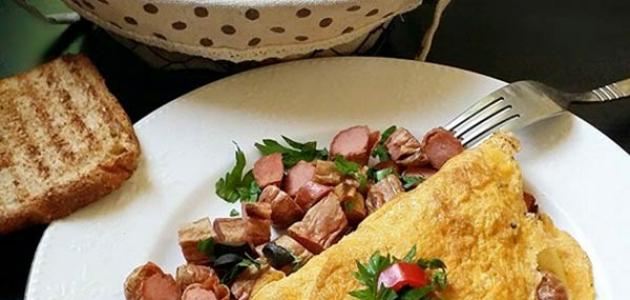 طريقة عمل بيض بالسجق طريقة عمل بيض بالسجق