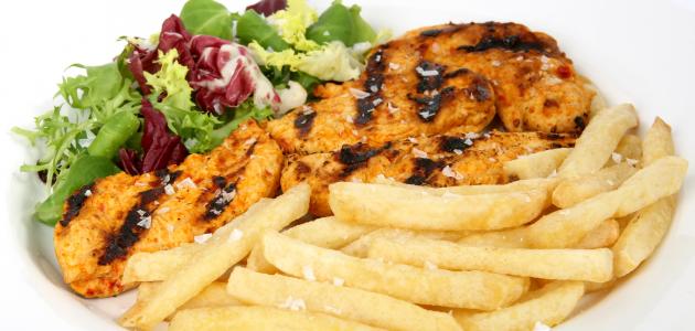 عمل الفراخ المشوية على الجريل عمل الفراخ المشوية على الجريل