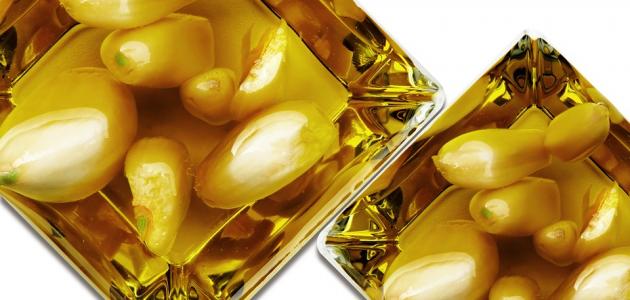 فوائد زيت الثوم لتطويل الشعر فوائد زيت الثوم لتطويل الشعر