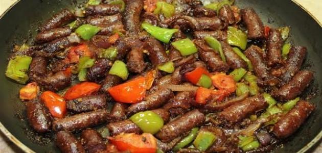 طريقة عمل السجق بالطماطم