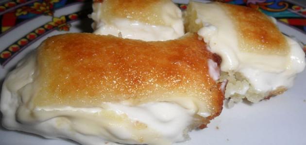 طريقة عمل بسبوسة بالقشطة طريقة عمل بسبوسة بالقشطة