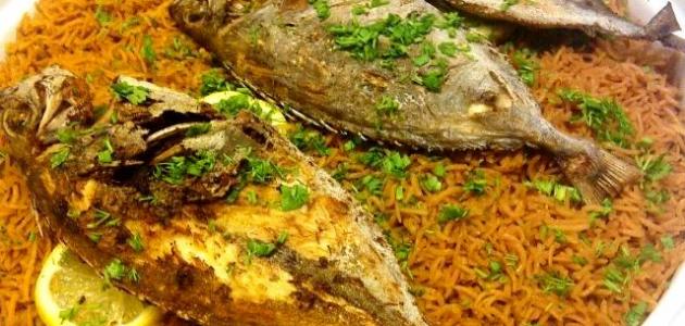 صورة طريقة طبخ السمك مع الأرز