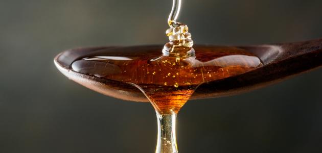 صورة فوائد قطرة العسل على السرة